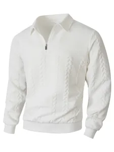 Close-up of white half-zip polo shirt with intricate jacquard and cable knit texture