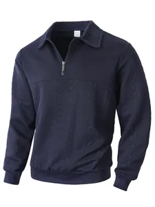 Detail view of navy jacquard knit texture on men's half-zip polo sweatshirt