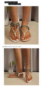 Detailed view of Bohemian beaded thong sandals with rhinestone and pearl accents