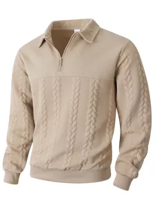 Macro view of men's khaki half-zip polo sweater showing intricate jacquard knit details