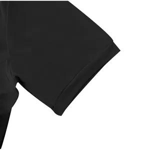 Close-up detail of smooth black fabric and double-stitched sleeve cuff of men's T-shirt.