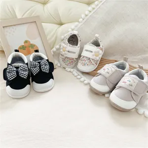 Assorted Japanese style soft-sole baby walking shoes with velcro straps and floral accents