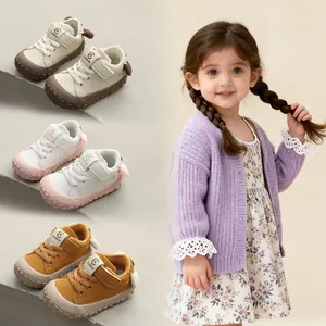 Comfortable baby soft sole walking shoes with anti-kick toe design for toddler infants.