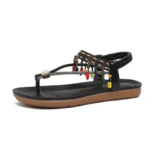 Bohemian flat sandals for women featuring colorful beads and sparkly rhinestones