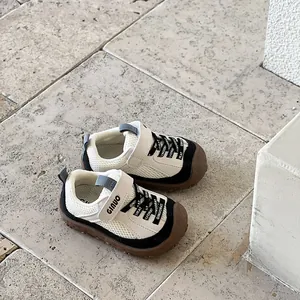 Detail of children's breathable toddler shoes with mesh upper and velcro strap