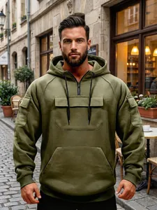 Men's olive green tactical half-zip hoodie with multiple pockets for outdoor casual wear.