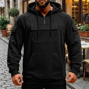 Detailed front view of a men's solid black multi-pocket half-zip hoodie for winter
