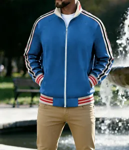 Detail of men's blue sporty jacket with striped webbing on sleeves and ribbed trim