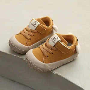 Mustard yellow baby toddler shoes with soft soles and anti-kick toe caps