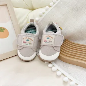 Soft-sole baby walking shoes with cute cartoon car print and Velcro strap closure