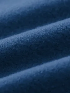 Macro view of soft blue fleece fabric texture for men's casual sports jacket detail
