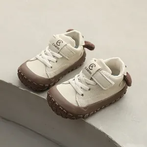 Beige toddler walking shoes with soft sole, anti-collision toe, and cute bear ears
