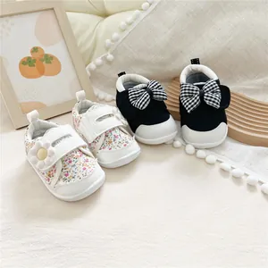 Mori style baby pre-walker shoes with soft soles and floral or checkered bow designs.