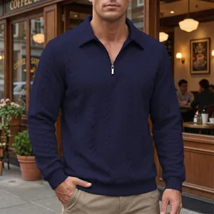 Close-up detail of navy blue cable-knit long sleeve polo shirt for men featuring half-zip.