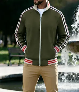 Detail showing the fit and striped sleeve design of men's olive green sports jacket.