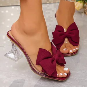 Elegant wine red bowknot sandals with transparent PVC strap and wine glass high heel