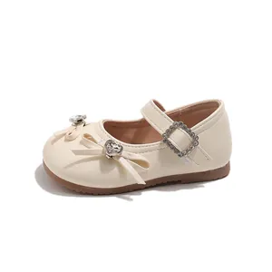 Elegante cremefarbene Prinzessinnenschuhe für Mädchen mit Strass und Schleife