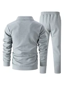 Back view of men's grey waffle-knit tracksuit set including slim-fit jacket and pants
