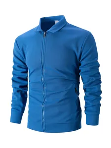 Close-up view of a blue waffle knit zip-up jacket with lapel and pocket details
