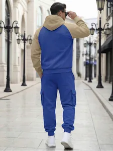 Rear view of a men's stylish blue and tan fleece tracksuit with multi-pocket cargo pants