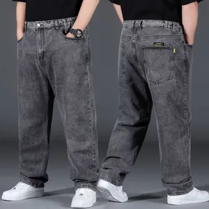 Men's oversized gray baggy jeans with straight leg fit and relaxed casual style