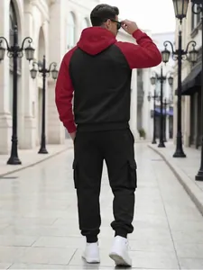 Back view of fleece-lined hooded tracksuit showing fit and cargo pocket placement
