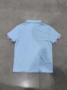 Detailed back view of light blue men's polo shirt with Bohemian colorful striped cuffs