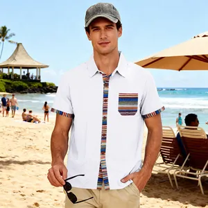 Detail view of a men's white short sleeve beach shirt with bohemian striped accents