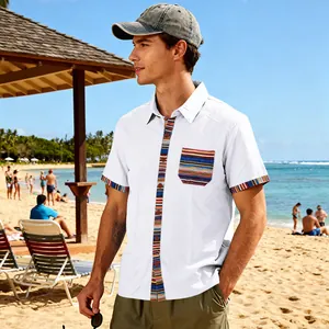 Detailed shot of white men's short-sleeve shirt with vibrant bohemian striped accents
