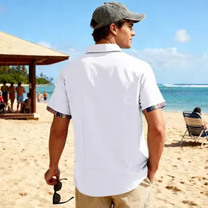 Back view of men's white beach shirt featuring bohemian patterned trim on sleeves