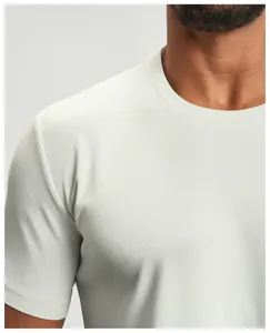 Close-up of breathable quick-dry fabric texture on men's athletic crew neck t-shirt.
