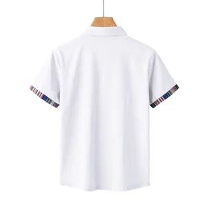 Back view of white short-sleeved shirt with colorful bohemian patterned cuffs