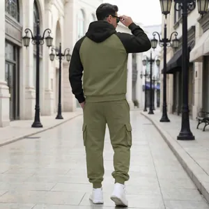 Back view of a men's olive green and black fleece tracksuit with cargo pockets