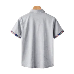 Back view of grey casual short sleeve shirt featuring bohemian striped contrast cuffs