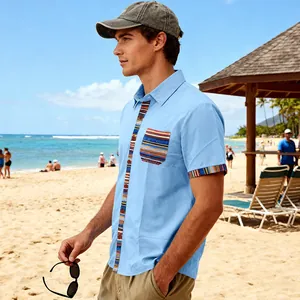 Men's bohemian style beach shirt with colorful striped trim in a summer beach setting