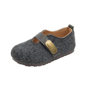 Children's retro grey felt Birkenstock-style shoes with leather buckle strap detail.