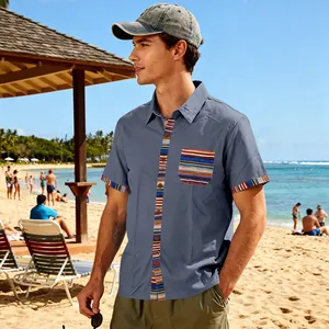Men's grey beach shirt with bohemian striped details in a sunny outdoor setting