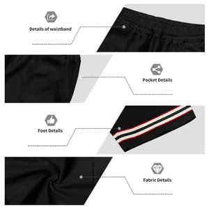 Close-up details of black waffle knit athletic shorts with striped hem and pockets.