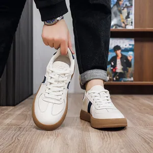 Close-up of premium men's leather German Army Trainer shoes featuring durable brown gum soles