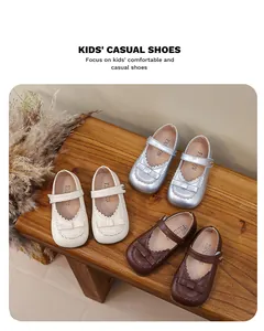 Detailed view of girls' Mary Jane princess shoes in silver, brown, and beige colors.