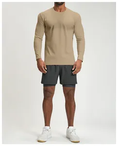 Detail of khaki quick-dry athletic long-sleeve shirt for men in studio setting