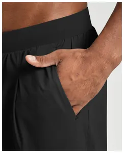 Detailed close-up of the side pocket on black quick-dry breathable men's outdoor sports pants