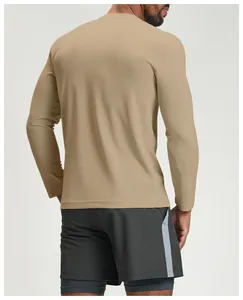 Back view of a tan long-sleeved quick-dry athletic shirt with breathable texture