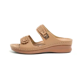 Elegant beige wedge sandals for women with floral detail and double straps design