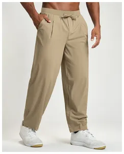 Detailed view showing the texture and fit of men's quick-dry khaki casual pants