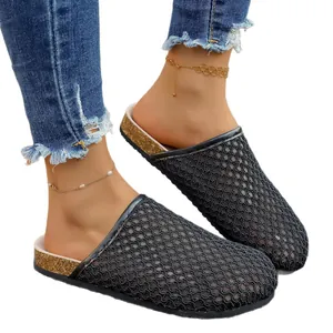 Breathable black woven mesh flat clogs for women, stylish retro summer slip-on mules.