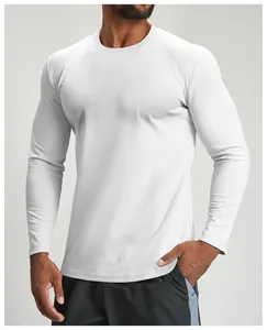 Detail shot of men's white quick-dry athletic long sleeve shirt showing texture