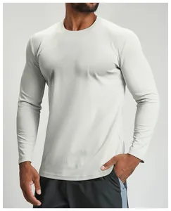 Close-up of light grey long-sleeve sports shirt featuring breathable mesh texture fabric.