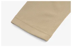 Close-up detail of breathable quick-dry mesh fabric with durable double-needle stitching