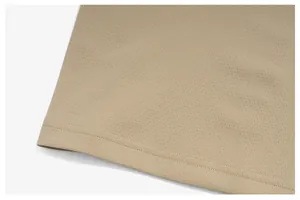 Close-up macro view of khaki quick-dry athletic top hem showing breathable mesh